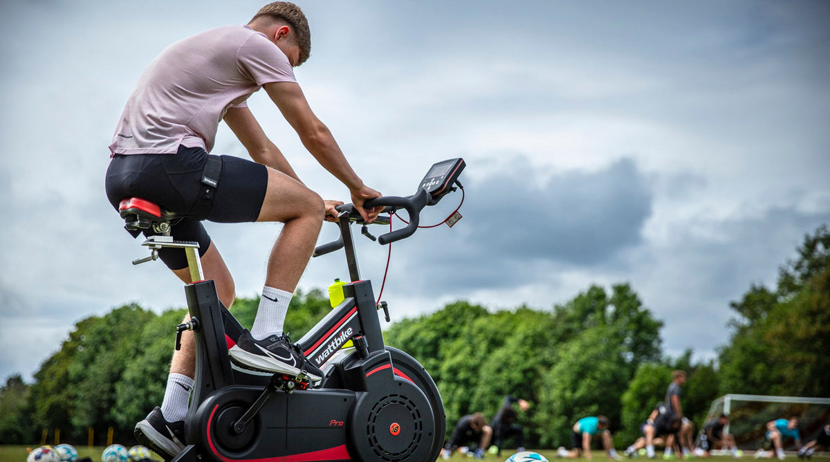 Athlete carrying out bike flush wearing Hytro Performance BFR Shorts
