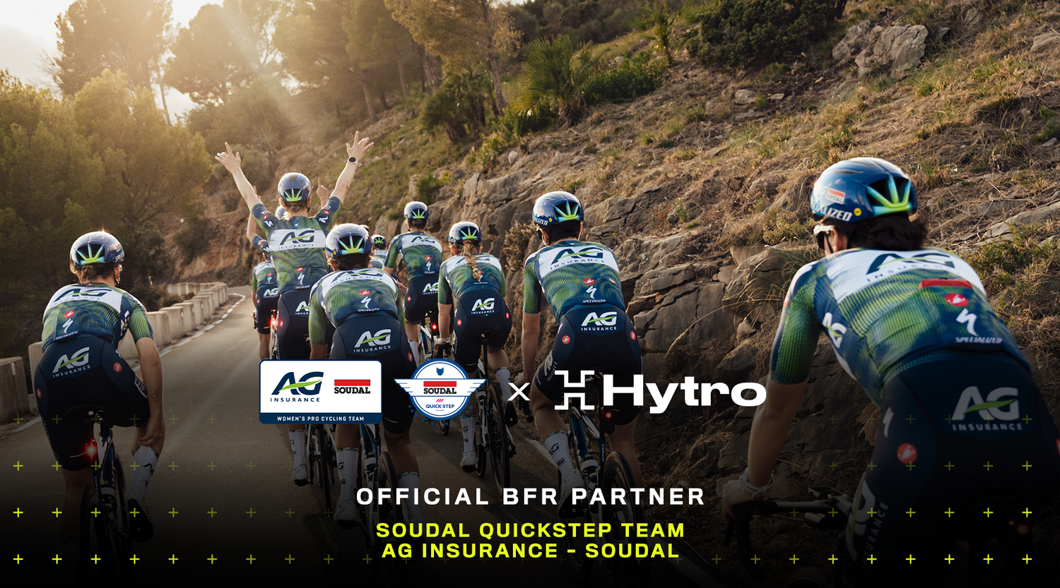 Hytro x Soudal Cycling logo lock up on background of team cycling in mountains