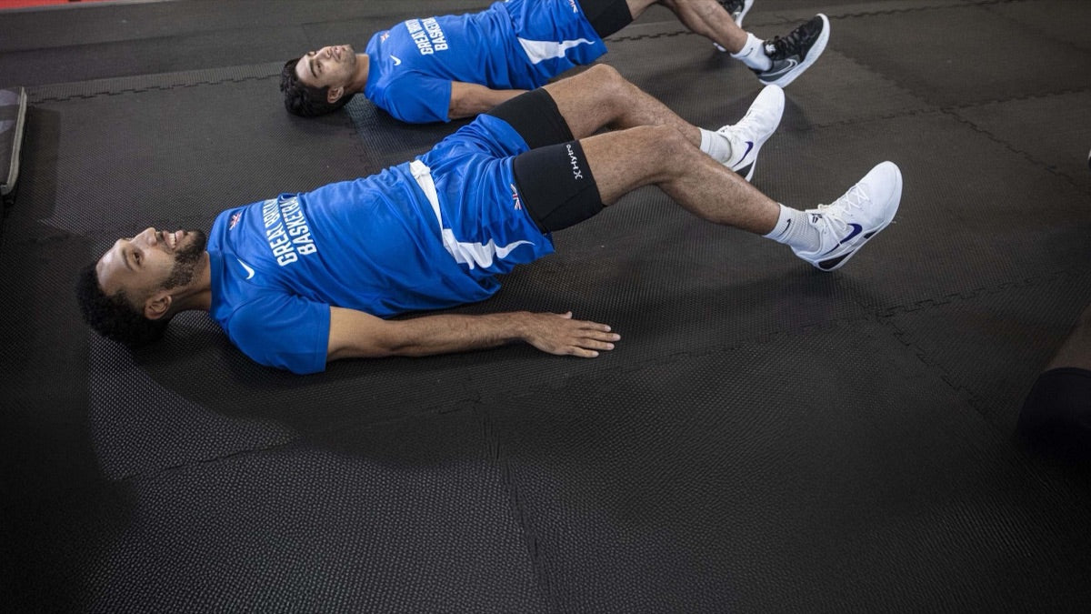 GB Basketball athletes running passive BFR recovery in Hytro straps
